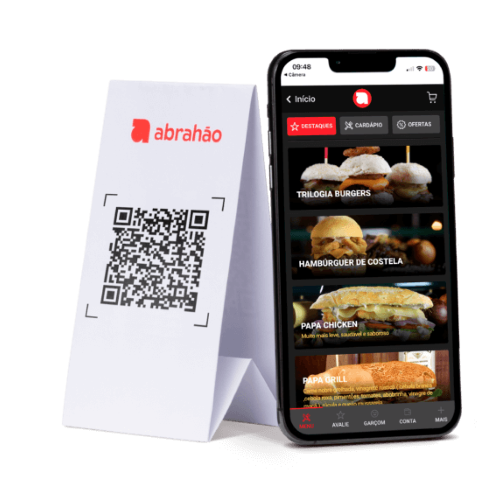 Imagem de um smartphone exibindo um aplicativo de pedidos de comida ao lado de uma bandeja com QR code para o restaurante Abrahao, que oferece diferentes opções de hambúrgueres e pratos.
